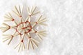 Straw Snowflake on White Snow, Christmas Strawy Snow Flake Royalty Free Stock Photo