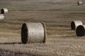 Straw stack after harvesting grain in the field Royalty Free Stock Photo
