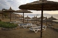 Straw umbrella on the beach in Red Sea coastline in Sharm El She