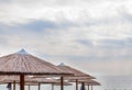 Straw umbrella on beautiful beach close Royalty Free Stock Photo