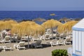 Straw umbrella and deckchairs at Tenerife Royalty Free Stock Photo