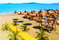 Straw umbrellas on beautiful sunny beach