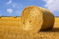 Strawbale on harvested field Royalty Free Stock Photo
