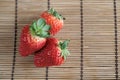 Strawberries on a bamboo table mat