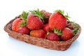 Strawberries in a basket isolated on white background Royalty Free Stock Photo