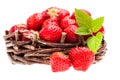 Strawberries in wicker basket isolated on white background Royalty Free Stock Photo