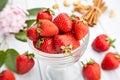 Strawberries bowl on bright wood Royalty Free Stock Photo