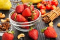 Strawberries bowl on wood