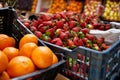 Strawberries in a box on the counter of the authentic Egyptian market. Fresh fruits in the street bazaar