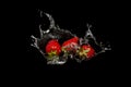 strawberries with crown water splash on black background Royalty Free Stock Photo