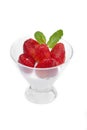 Strawberries in a cup with cream of milk Royalty Free Stock Photo