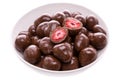 strawberries in dark chocolate.candies. in a white dish close-up.isolated food products Royalty Free Stock Photo