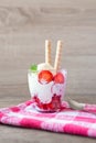 Strawberries dessert with biscuit and ice cream