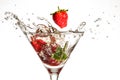 Strawberries Dropping in Martini Glass Royalty Free Stock Photo