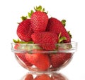 Strawberries in a glass bowl isolated white background. Royalty Free Stock Photo