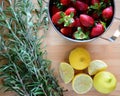 Strawberries, lemons, and herbs Royalty Free Stock Photo
