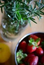 Strawberries, lemons, and herbs