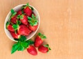 Strawberries. Organic Closeup with mint, natural non GMO rustic