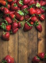 Strawberries over natural wooden background Royalty Free Stock Photo