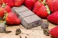 Strawberries raw chocolate on whooden table Royalty Free Stock Photo