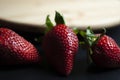 Strawberries on round wood tray