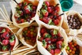 Strawberries in sacks on a buffet, festive serve Royalty Free Stock Photo