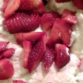 Strawberries slices and whipped cream