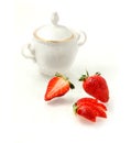 Strawberries and sugar-bowl Royalty Free Stock Photo