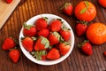 Strawberries and tangerines Royalty Free Stock Photo