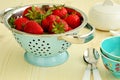 Strawberries in vintage colander Royalty Free Stock Photo