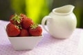 Strawberries in a white angled bowl