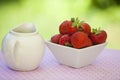 Strawberries in a white angled bowl