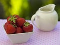 Strawberries in a white angled bowl