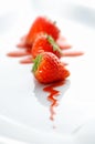 Strawberries on white dish