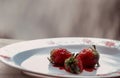 strawberries on a white plate