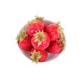 Top view on a small bowl full of big strawberries Royalty Free Stock Photo
