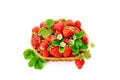 Strawberries in a wicker basket isolated on white background. Royalty Free Stock Photo