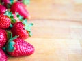 Strawberries on a wooden board with empty space Royalty Free Stock Photo