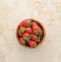 Strawberries in a wooden bowl Royalty Free Stock Photo