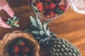 Strawberries in a wooden teak bowl. Indonesian teak bowl.