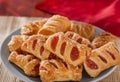 Strawberry and apple filled sugar coated puff pastry cakes close Royalty Free Stock Photo