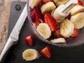 Strawberry banana in a blender ready to blend