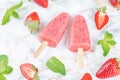 Strawberry banana ice cream with mint and fresh strawberries Royalty Free Stock Photo