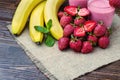 Strawberry and banana smoothie in the glass. Fresh strawberries Royalty Free Stock Photo