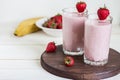 Strawberry banana smoothie healthy breakfast drink in glass Royalty Free Stock Photo