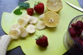 Strawberry and banana smoothie in the jar. Ingredients for making smoothies strawberry banana, frozen berries in a blender on a