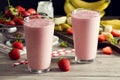 Strawberry Banana Yogurt Smoothies with Ingredients Royalty Free Stock Photo
