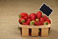 Strawberry in basket with price sign on canvas Royalty Free Stock Photo