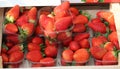 strawberry baskets displayed for sale-