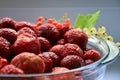 Strawberry berries close-up partially blurred. Strawberries with glassware. Diet healthy natural food. Berry fruit background Royalty Free Stock Photo